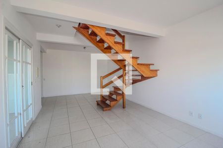 Sala de casa de condomínio à venda com 2 quartos, 99m² em Campo Novo, Porto Alegre
