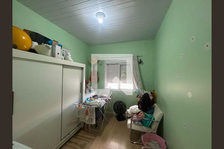 Quarto 2 de casa de condomínio para alugar com 2 quartos, 47m² em Distrito Industrial, Cachoeirinha
