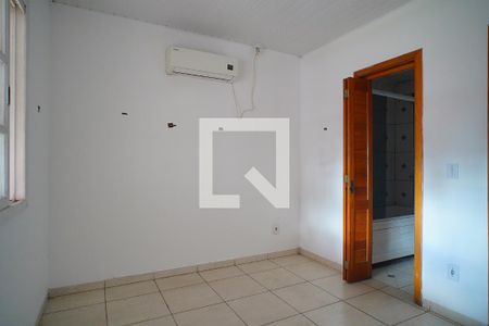Quarto suíte  de casa à venda com 3 quartos, 150m² em Rubem Berta, Porto Alegre