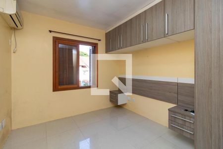Quarto 1 de casa de condomínio para alugar com 2 quartos, 95m² em Ipanema, Porto Alegre