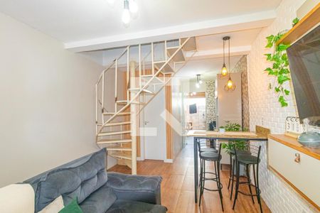Sala de casa de condomínio à venda com 2 quartos, 45m² em Rio Branco, Canoas