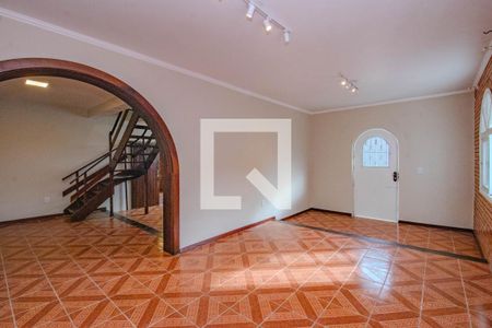Sala de casa à venda com 3 quartos, 204m² em Santa Maria Goretti, Porto Alegre