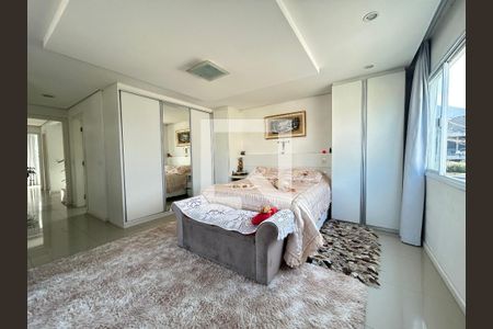Suíte 1 de casa para alugar com 5 quartos, 440m² em Cacupé, Florianópolis