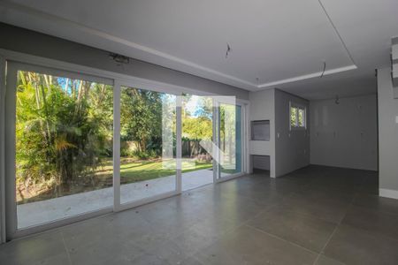 Sala de casa de condomínio para alugar com 3 quartos, 300m² em Pedra Redonda, Porto Alegre