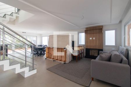 Sala de casa de condomínio para alugar com 3 quartos, 330m² em Pedra Redonda, Porto Alegre