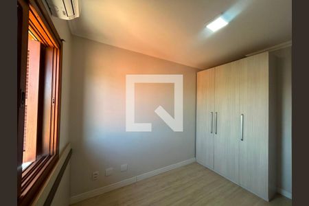 Quarto 2 de casa de condomínio à venda com 3 quartos, 117m² em Igara, Canoas
