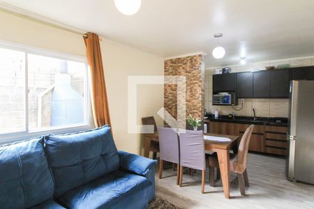 Sala de casa de condomínio à venda com 2 quartos, 80m² em Olaria, Canoas