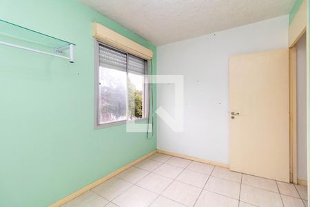 Quarto 2 de apartamento para alugar com 2 quartos, 52m² em Vila Nova, Porto Alegre