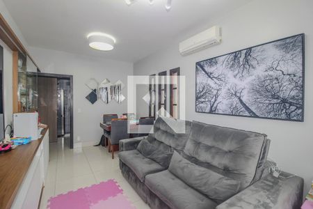 Sala de casa de condomínio para alugar com 3 quartos, 144m² em Vila Nova, Porto Alegre