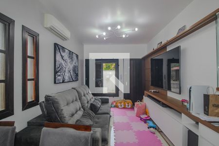 Sala de casa de condomínio para alugar com 3 quartos, 144m² em Vila Nova, Porto Alegre