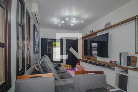 Sala de casa de condomínio para alugar com 3 quartos, 144m² em Vila Nova, Porto Alegre