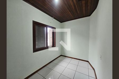 Quarto 1 de casa para alugar com 2 quartos, 90m² em Passo dos Ferreiros, Gravataí