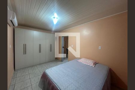 Quarto 1 de casa para alugar com 2 quartos, 70m² em Mathias Velho, Canoas