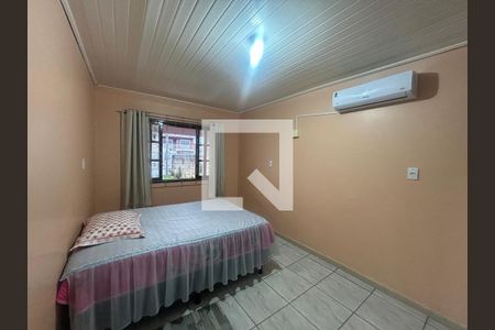 Quarto 1 de casa para alugar com 2 quartos, 70m² em Mathias Velho, Canoas