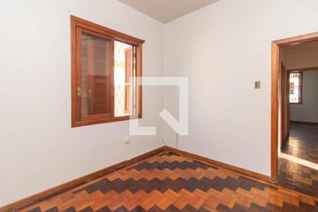 Quarto 1 de casa à venda com 2 quartos, 125m² em Santo Antônio, Porto Alegre