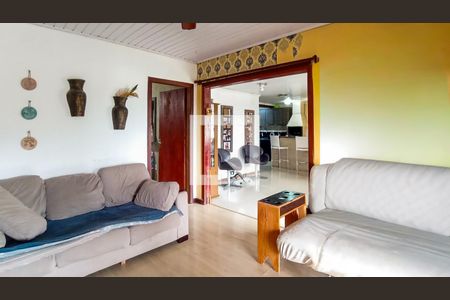 Sala  de casa à venda com 3 quartos, 150m² em Vila Nova, Porto Alegre
