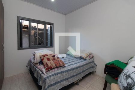 Quarto 1 de casa à venda com 3 quartos, 155m² em Restinga, Porto Alegre