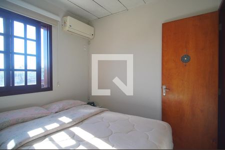 Quarto 1 de casa de condomínio à venda com 2 quartos, 44m² em Vicentina, São Leopoldo