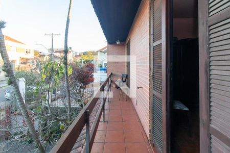 Sacada de casa à venda com 4 quartos, 200m² em Partenon, Porto Alegre
