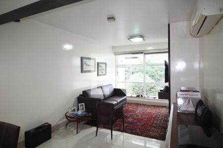Sala de apartamento à venda com 1 quarto, 65m² em Auxiliadora, Porto Alegre