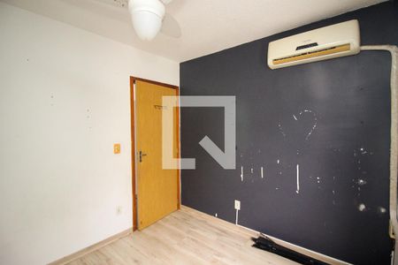 Quarto 1 de apartamento para alugar com 2 quartos, 40m² em Restinga, Porto Alegre