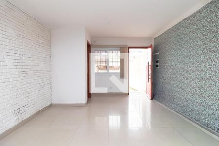 Sala de casa para alugar com 2 quartos, 128m² em Guarujá, Porto Alegre