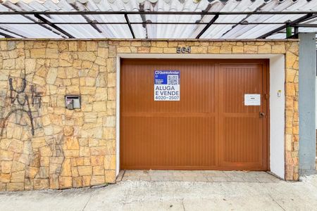 Casa à venda com 260m², 4 quartos e 4 vagas Casa à venda com 260m², 4 quartos e 4 vagasFachada