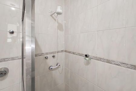Casa à venda com 260m², 4 quartos e 4 vagas Casa à venda com 260m², 4 quartos e 4 vagasBanheiro da Suíte 1