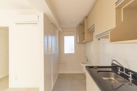 Apartamento à venda com 121m², 2 quartos e 2 vagas Apartamento à venda com 121m², 2 quartos e 2 vagasCozinha e Área de Serviço