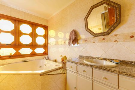 Casa para alugar com 345m², 3 quartos e 4 vagasBanheiro da Suíte 1