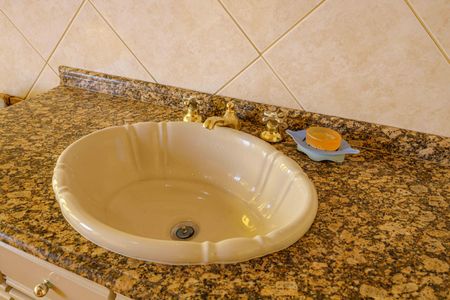 Casa para alugar com 345m², 3 quartos e 4 vagasBanheiro da Suíte 1