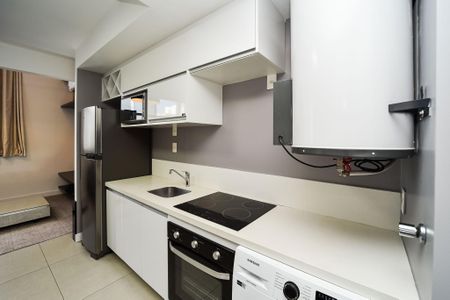 Apartamento à venda com 80m², 1 quarto e 2 vagas Apartamento à venda com 80m², 1 quarto e 2 vagasCozinha e Área de Serviço