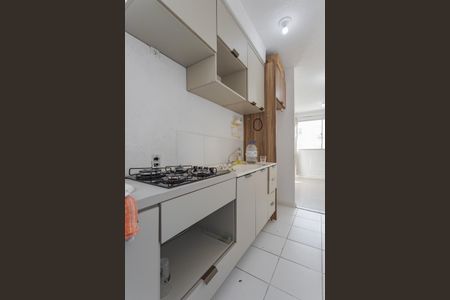 Apartamento à venda com 40m², 2 quartos e 1 vaga Apartamento à venda com 40m², 2 quartos e 1 vagaCozinha e Área de Serviço
