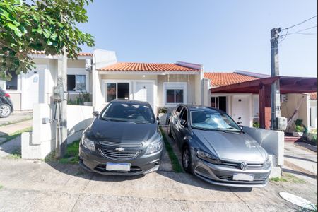 Fachada de casa de condomínio para alugar com 2 quartos, 50m² em Formoza, Alvorada