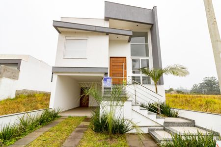 Casa à venda com 165m², 3 quartos e 2 vagas Casa à venda com 165m², 3 quartos e 2 vagasFachada