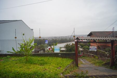 Casa à venda com 70m², 1 quarto e 2 vagas Casa à venda com 70m², 1 quarto e 2 vagasFachada + Placa