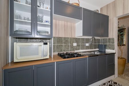 Casa à venda com 100m², 3 quartos e 2 vagas Casa à venda com 100m², 3 quartos e 2 vagasCozinha