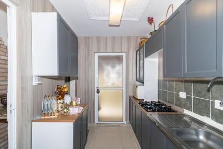 Casa à venda com 100m², 3 quartos e 2 vagas Casa à venda com 100m², 3 quartos e 2 vagasCozinha