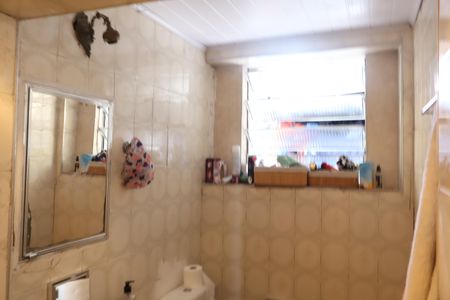 Casa à venda com 100m², 3 quartos e 2 vagasBanheiro da casa - rua lateral