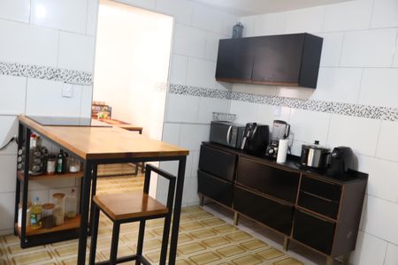 Casa à venda com 100m², 3 quartos e 2 vagasCozinha da casa - rua lateral