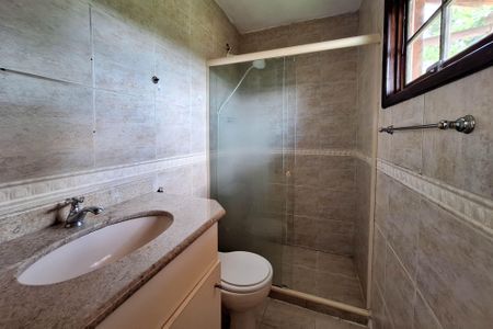 Casa de condomínio para alugar com 130m², 3 quartos e 2 vagasBanheiro da Suíte 1
