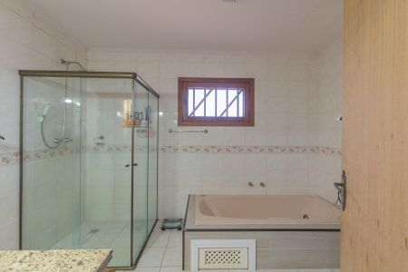 Casa à venda com 310m², 4 quartos e 4 vagas Casa à venda com 310m², 4 quartos e 4 vagasBanheiro da Suíte