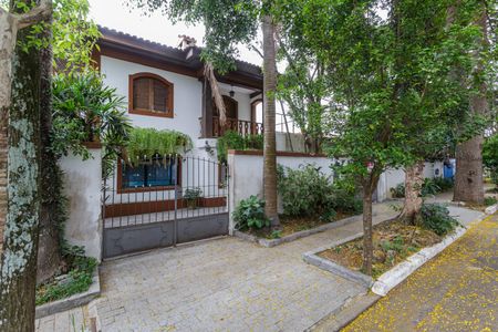 Casa à venda com 160m², 4 quartos e 4 vagas Casa à venda com 160m², 4 quartos e 4 vagasFachada
