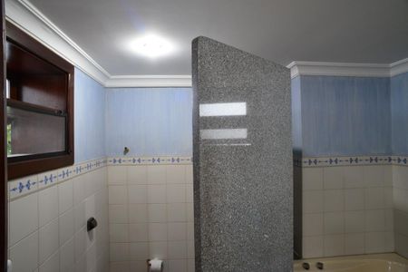 Casa de condomínio à venda com 432m², 4 quartos e 3 vagasBanheiro Suíte Principal