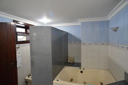 Casa de condomínio à venda com 432m², 4 quartos e 3 vagasBanheiro Suíte Principal