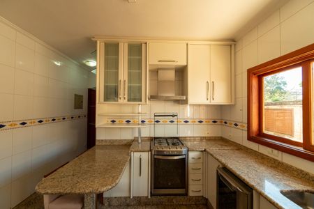 Casa de condomínio para alugar com 282m², 4 quartos e 4 vagasCozinha