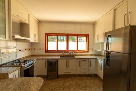 Casa de condomínio para alugar com 282m², 4 quartos e 4 vagasCozinha