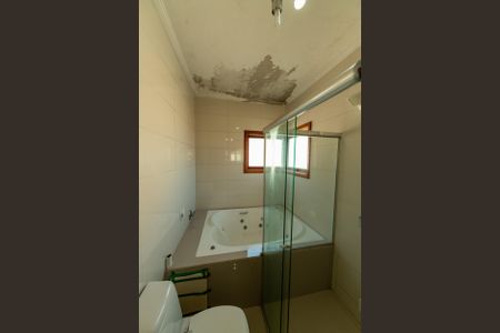 Casa de condomínio para alugar com 282m², 4 quartos e 4 vagasBanheiro Suite Master