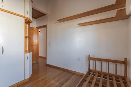 Quarto 2 de casa à venda com 3 quartos, 190m² em Rubem Berta, Porto Alegre