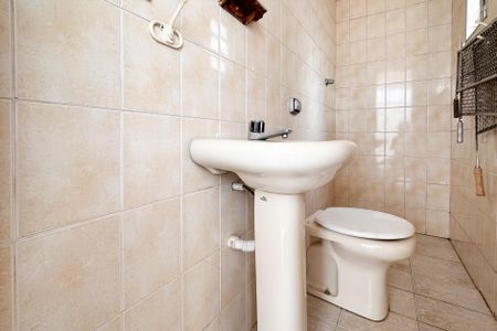 Casa para alugar com 317m², 4 quartos e 4 vagasBanheiro de Serviço